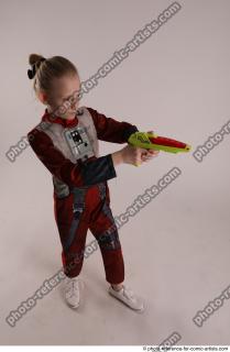 23 2019 01 DENISA PILOT STANDING POSE WITH GUN 3